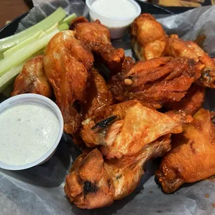 Buffalo wild 12 Piece Classic Wings served with two sides of ranch and celery