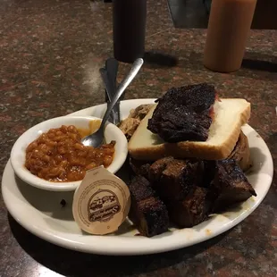 The three meat platter with a side of beans. Yummy!