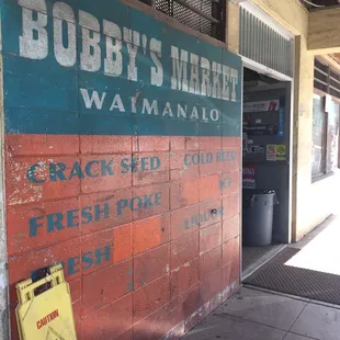 a sign on the side of a building