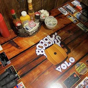 Table top complete with local advertisements