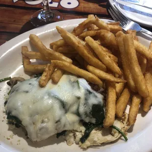 a plate of food with french fries