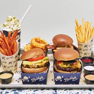 a tray of burgers and fries