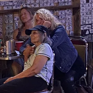 three women sitting at a table