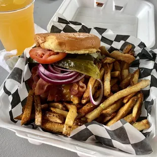 Half pound burger with homemade fries.