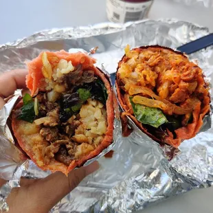 Two different burritos - beef (left) and spicy pork (right)