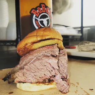 a roast beef sandwich on a bun