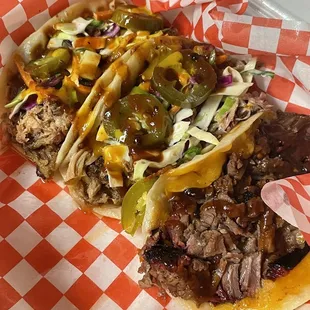 Pulled pork tacos and a brisket taco