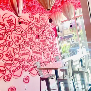 a mural of hearts and balloons