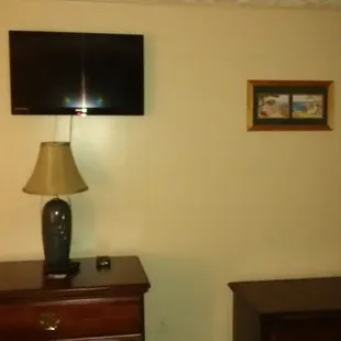 a flat screen tv mounted on the wall