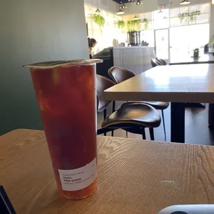 Lychee jelly in pink guava fruit tea