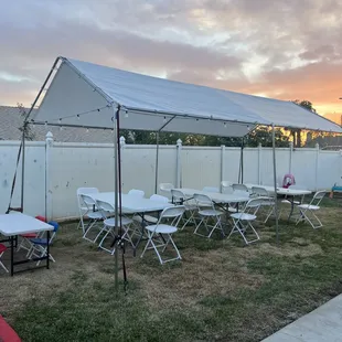 10x20 canopy with lights, kids table, chairs and tables