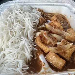 2024! 30 years of ordering the same dish. #77 Sauteed Lemon Grass Tofu with Rice Noodles. Always EXCELLENT. Takeout tonight.