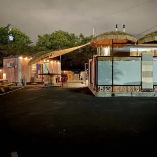 Cute high top tables around the backside.