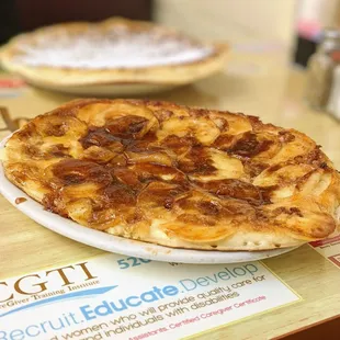 Apple Pancake with an order of extra apples and nuts.
