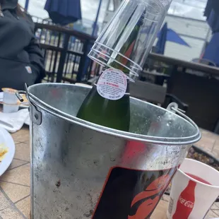 Bucket of champagne $13.50 or $17 with juice