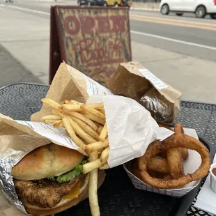 Burger, Fried Chicken Sandwich, Sweet Potato Fries, onion rings, and hot dog