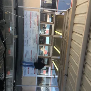 a black cat sitting in a window