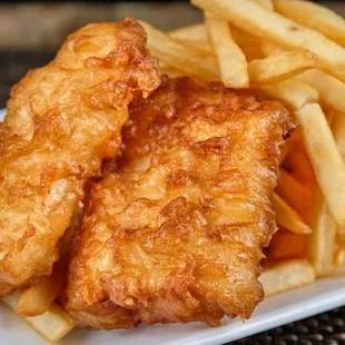 (2) 3oz portions on Alaskan wild cod hand dipped in our special house batter. Served with fries and slaw 
 Add extra piece of fish