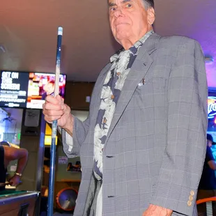 a man holding a baseball bat