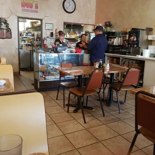 cashier and kitchen behind to the right