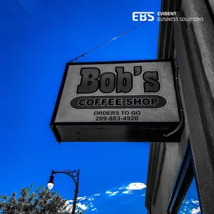 a sign for bob&apos;s coffee shop