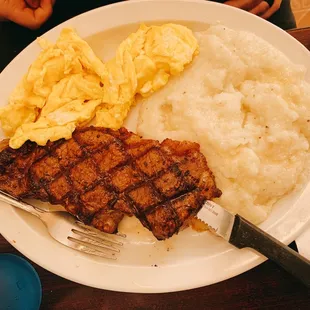 Steak and scrambled eggs with grits