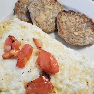 Egg white omelet with tomato, onion and cheese, turkey sausage.