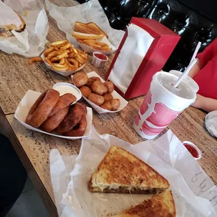 Patty melt, onion rings, fried mushrooms, burgers and fries