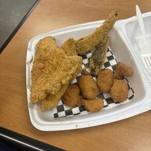 Fried catfish, potato wedges, corn nuggets