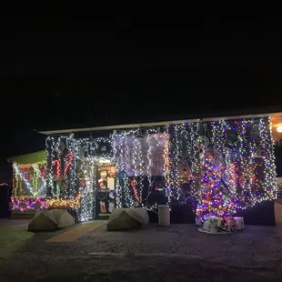 a house covered in christmas lights