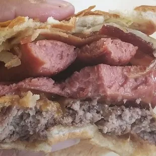 Inside of a bacon burger dog