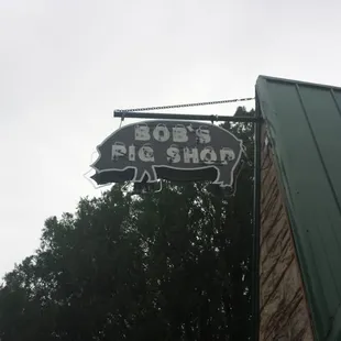 a sign for bob&apos;s pig shop