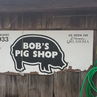 a sign for bob&apos;s pig shop