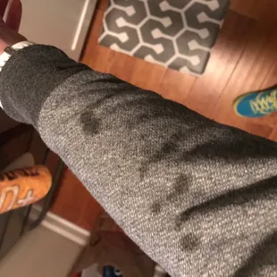 Grease from pizza leaked through box onto shirt