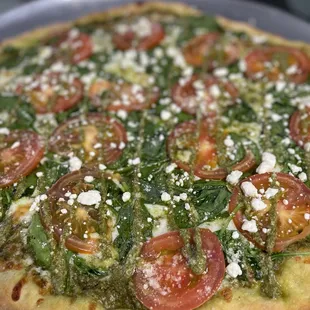 Delicious Pesto, Spinach, &amp; Tomato pizza with FETA