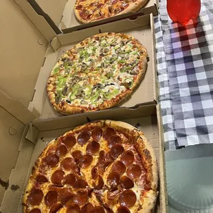 Bobs Party Pack includes 3 Large 2 topping pizzas and a 2 Liter soda