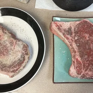 Bone in (right) and boneless (left) ribeyes