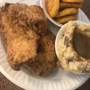 Fried pork chops.. mashed potatoes.. and squash..