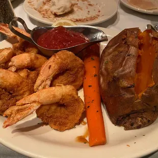 Shrimp with cocktail sauce and sweet potatoes