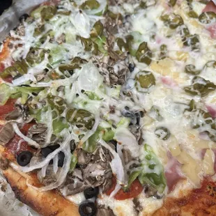 Half combination, half Hawaiian + jalapeño with extra cheese