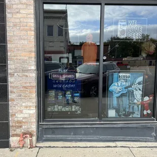 the reflection of a car in the window