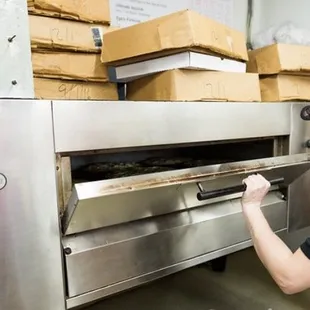 Checking on those pizza pies !!!