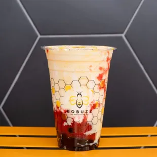 a cold drink in a plastic cup
