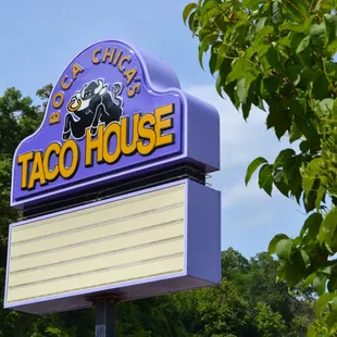 a taco house sign