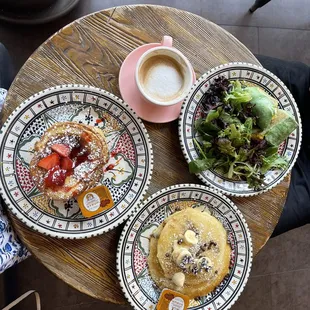 On the go wrap, strawberry chocolate French toast and chocolate banana pancakes, cappuccino!!