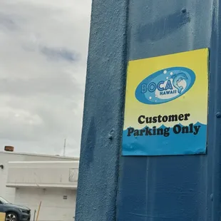 Boca parking lot sign