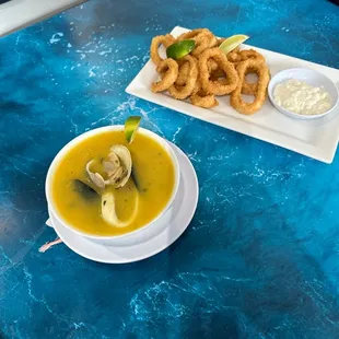 Seafood soup and fried calamari appetizers.. Yummm