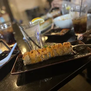 a plate of sushi on a table