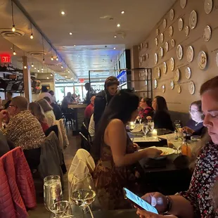 a group of people in a restaurant