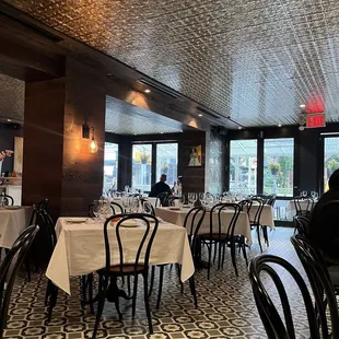 a restaurant with tables and chairs